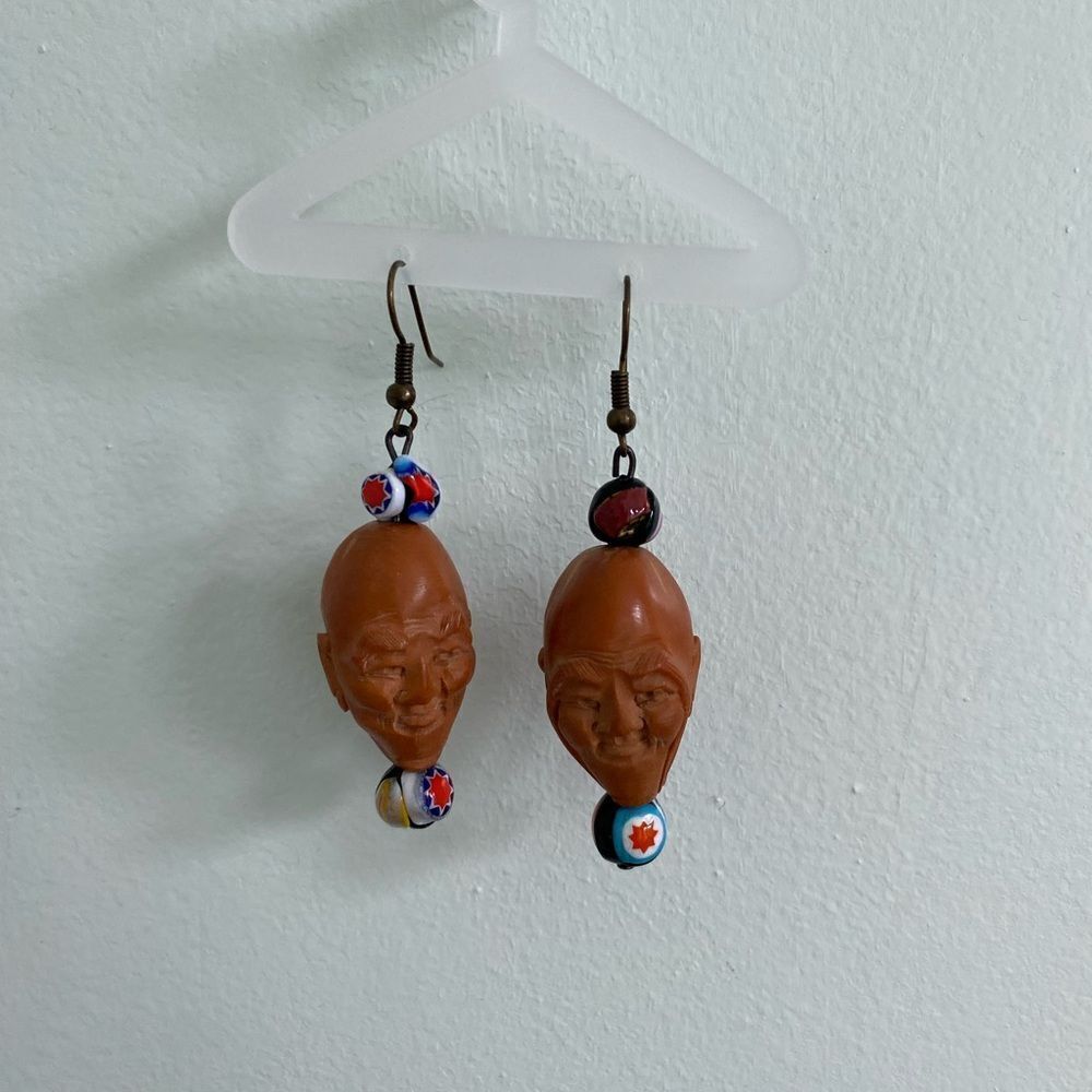 Chinese Carved Jolly Face Olive Pit Earrings
